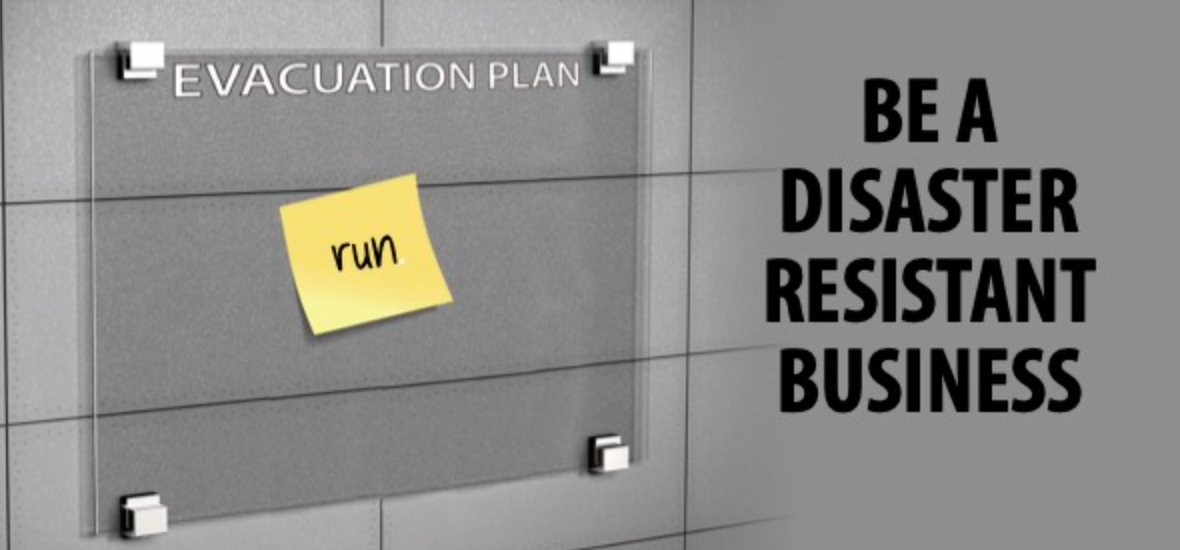 Evacation Plan sign on wall with "run" post it note (only), plus words Be a Disaster Resistant Business"